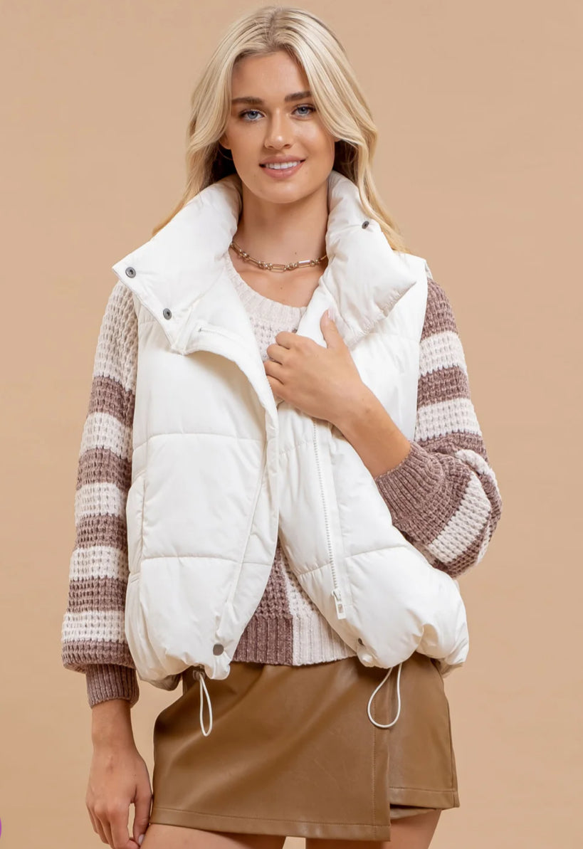 CREAM ASYMMETRICAL ZIP UP HIGH NECK PUFFER VEST