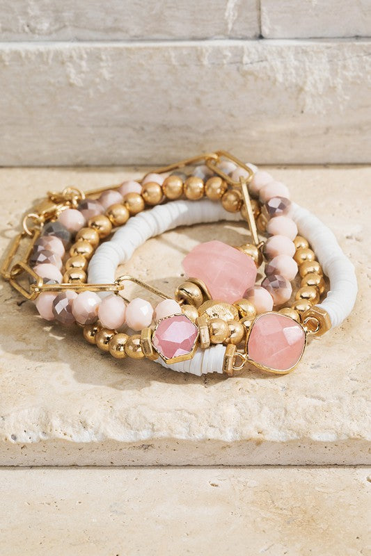 Gold layered stretch bracelet with white and pink beads - La Maison