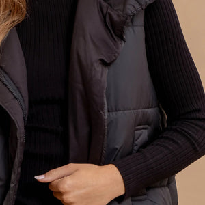 BLACK ASYMMETRICAL ZIP UP HIGH NECK PUFFER VEST