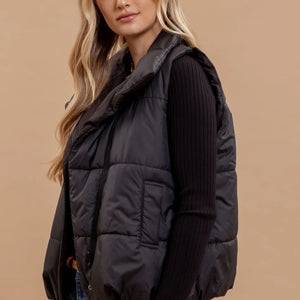 BLACK ASYMMETRICAL ZIP UP HIGH NECK PUFFER VEST