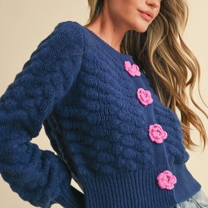 TEXTURED SWEATER CARDIGAN WITH KNIT ROSETTE DETAIL