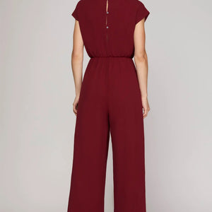 WINE SHORT SLEEVE WOVEN JUMPSUIT WITH FRONT TIE DETAIL