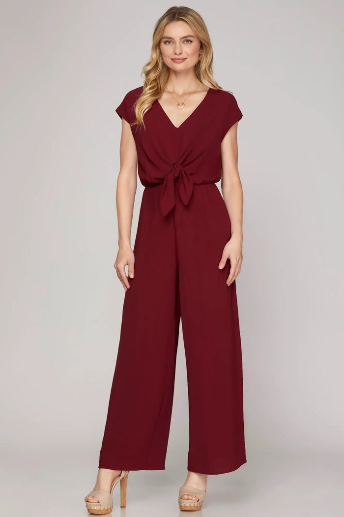 WINE SHORT SLEEVE WOVEN JUMPSUIT WITH FRONT TIE DETAIL
