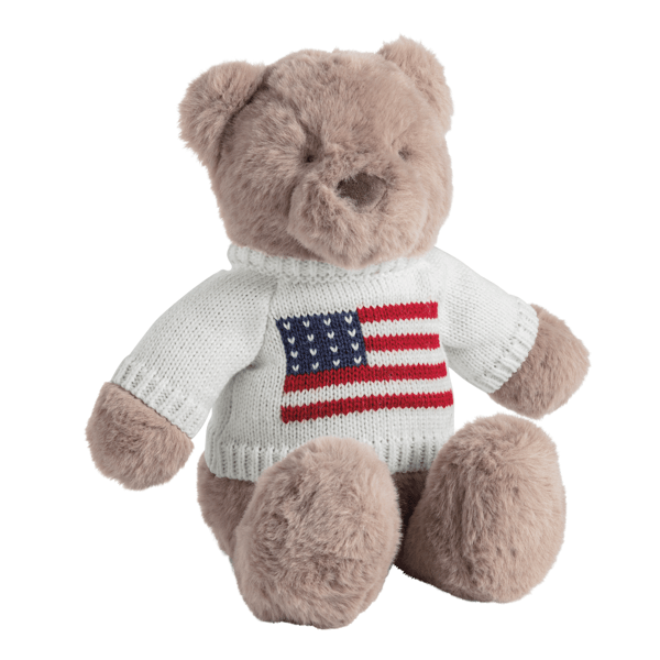 Stuffed teddy bear with American flag sweater