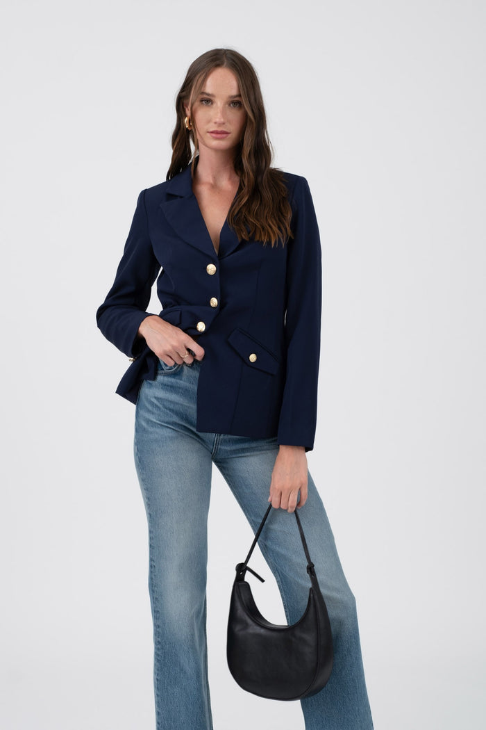 Navy blazer with gold accents