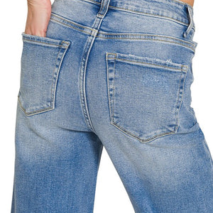 DISTRESSED RAW HEM DENIM PANTS
