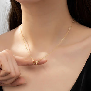 DELICATE BOW NECKLACE (GOLD OR SILVER)