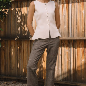 Cream SLEEVELESS SWEATER KNIT PEPLUM TOP