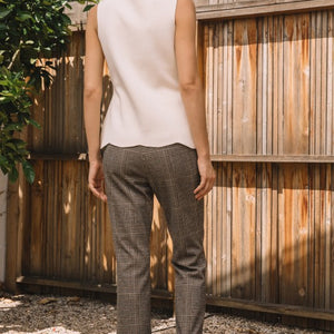 Cream SLEEVELESS SWEATER KNIT PEPLUM TOP