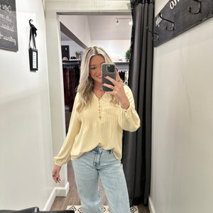 Cream Solid V Neck Pin Tuck Buttoned Woven Blouse