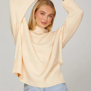 Cream long sleeve mock neck knit sweater