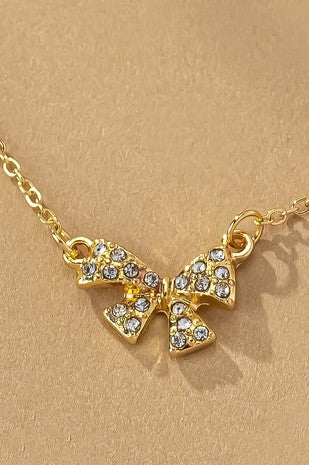 Pave rhinestone bow pendant necklace