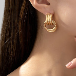 Intertwined hoop door knocker earrings