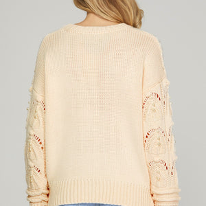 LONG SLEEVE PATTERNED SWEATER WITH PEARL TRIM