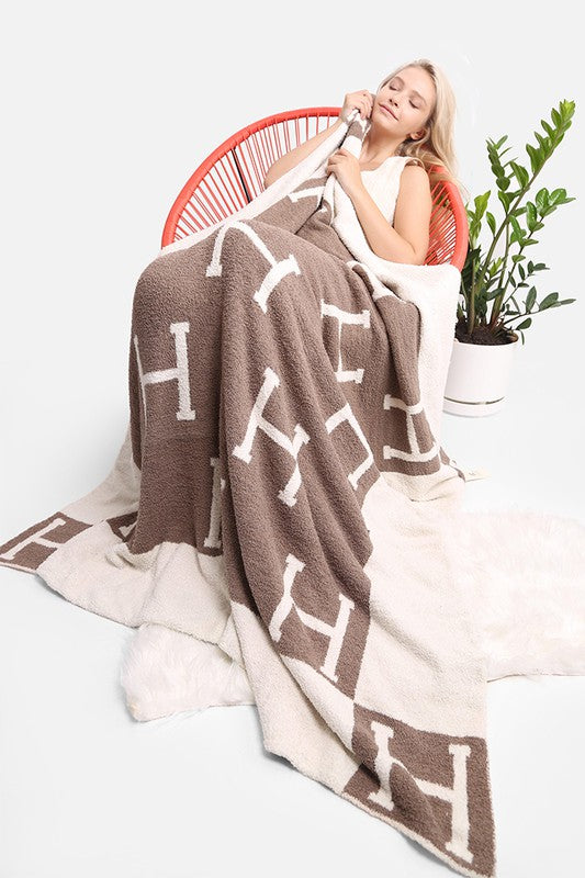 Beige luxury H cozy blanket